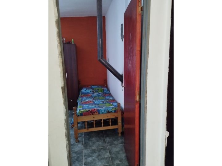 Anisacate, recta Montenegro casa 2 dorm. liv. patio y construcción a terminar 70%  U$S70.000
